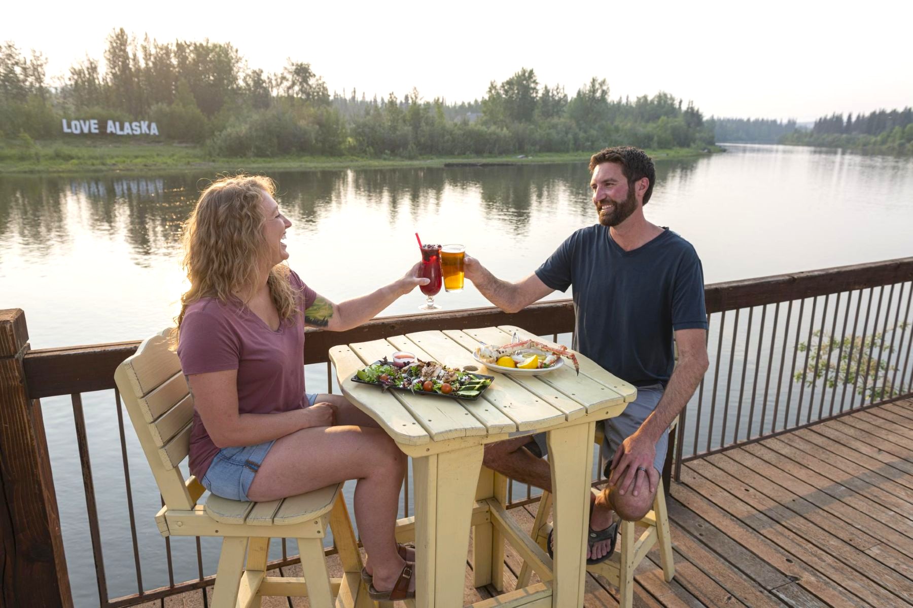 Couple dining in Fairbanks in summer