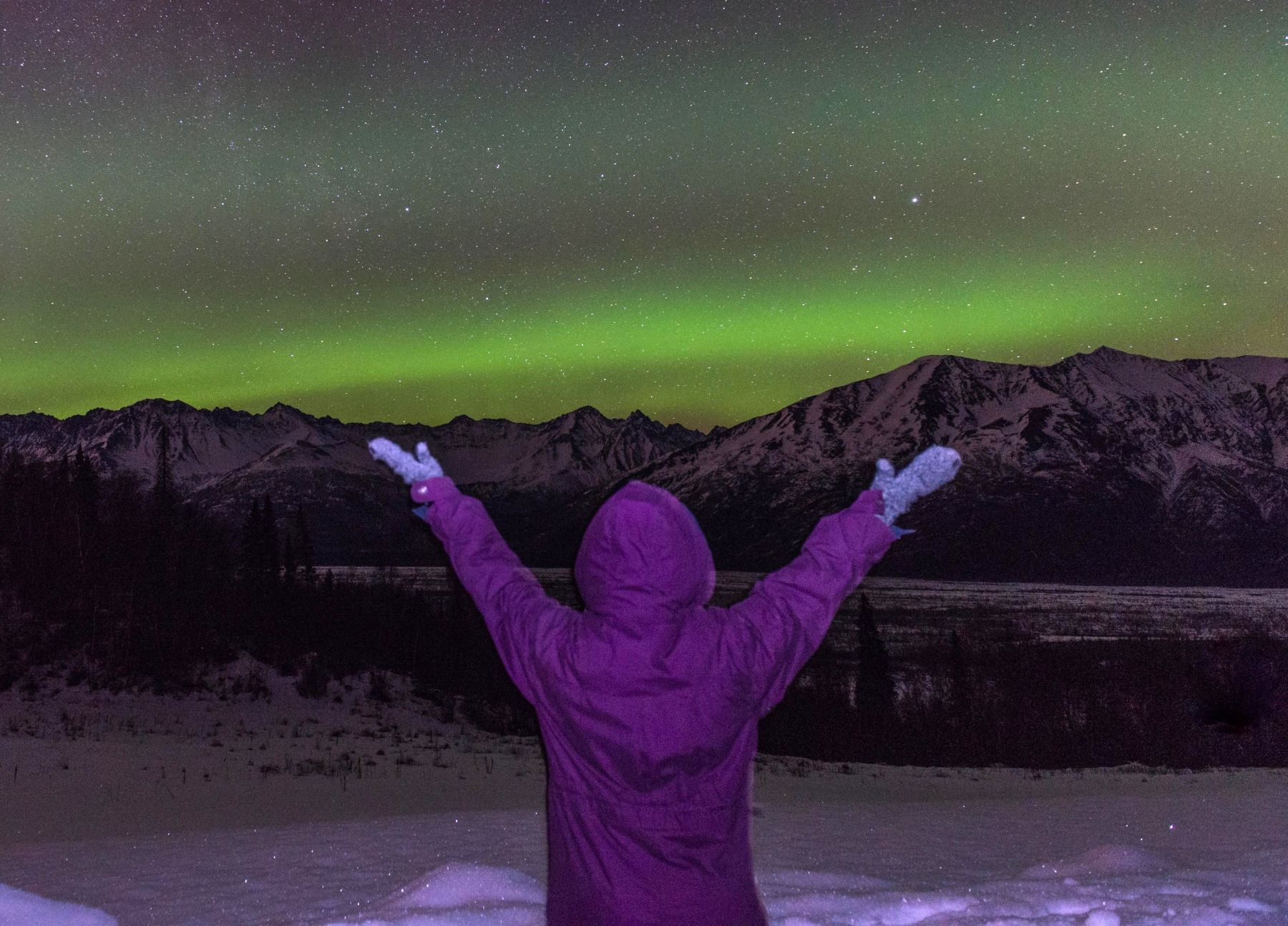 Woman viewing the northern lights