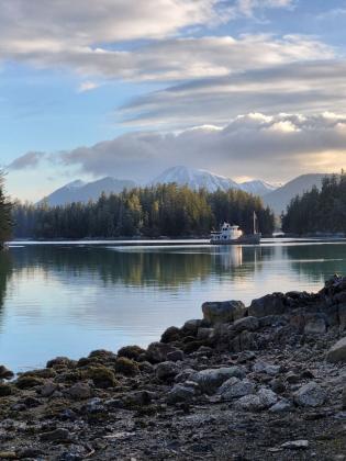 Small ship cruise in a bay in Alaska
