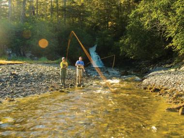 People fishing a river in Cordova