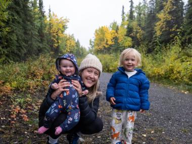 A family hikes in Denali National Park