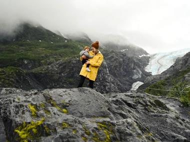 Mom and baby hiking at Exit Glacier in Kenai Fjords National Park