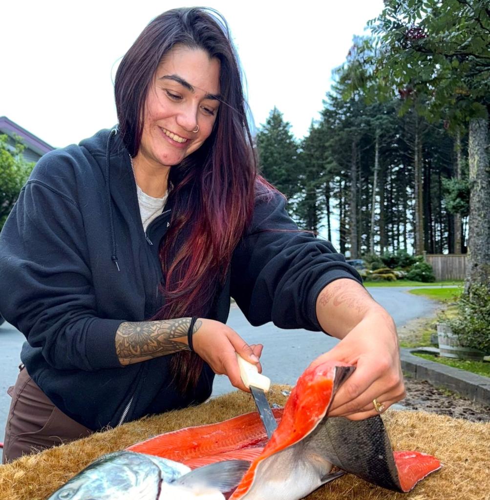 Jade filleting salmon