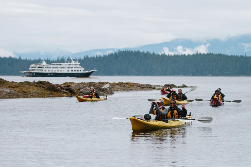 Kayaking near an adventure cruise