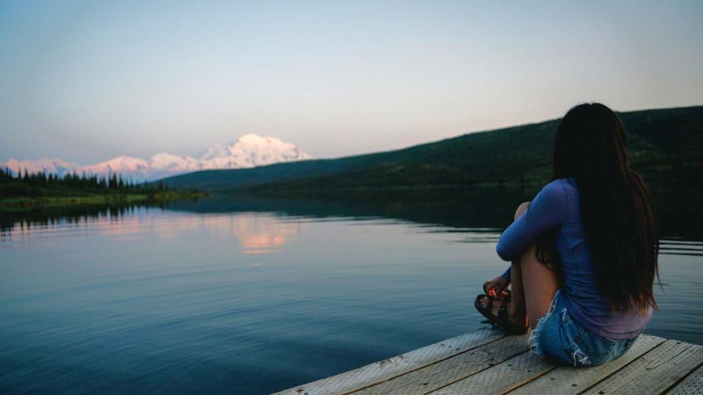 Woman on a dock in Denali National Park