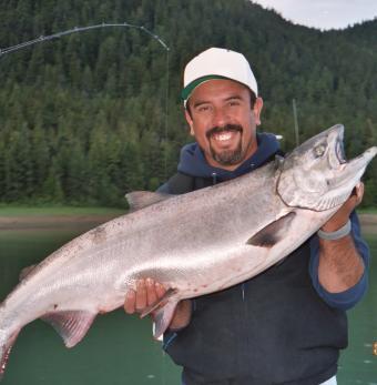 Dude with king salmon Photo